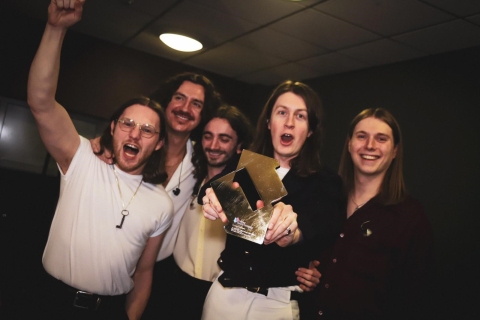 Blossoms pictured with their Official Number 1 Album Award from the Official Charts Company for Foolish Loving Spaces (credit: OfficialCharts.com)