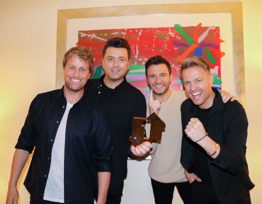 Westlife with their Official Number 1 Album Award for Spectrum (credit: OfficialCharts.com)