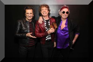 The Rolling Stones pose with their Official Number 1 Album Award to celebrate their Official Number 1 album with Hackney Diamonds (credit: Kevin Mazur/@kevinmazur)